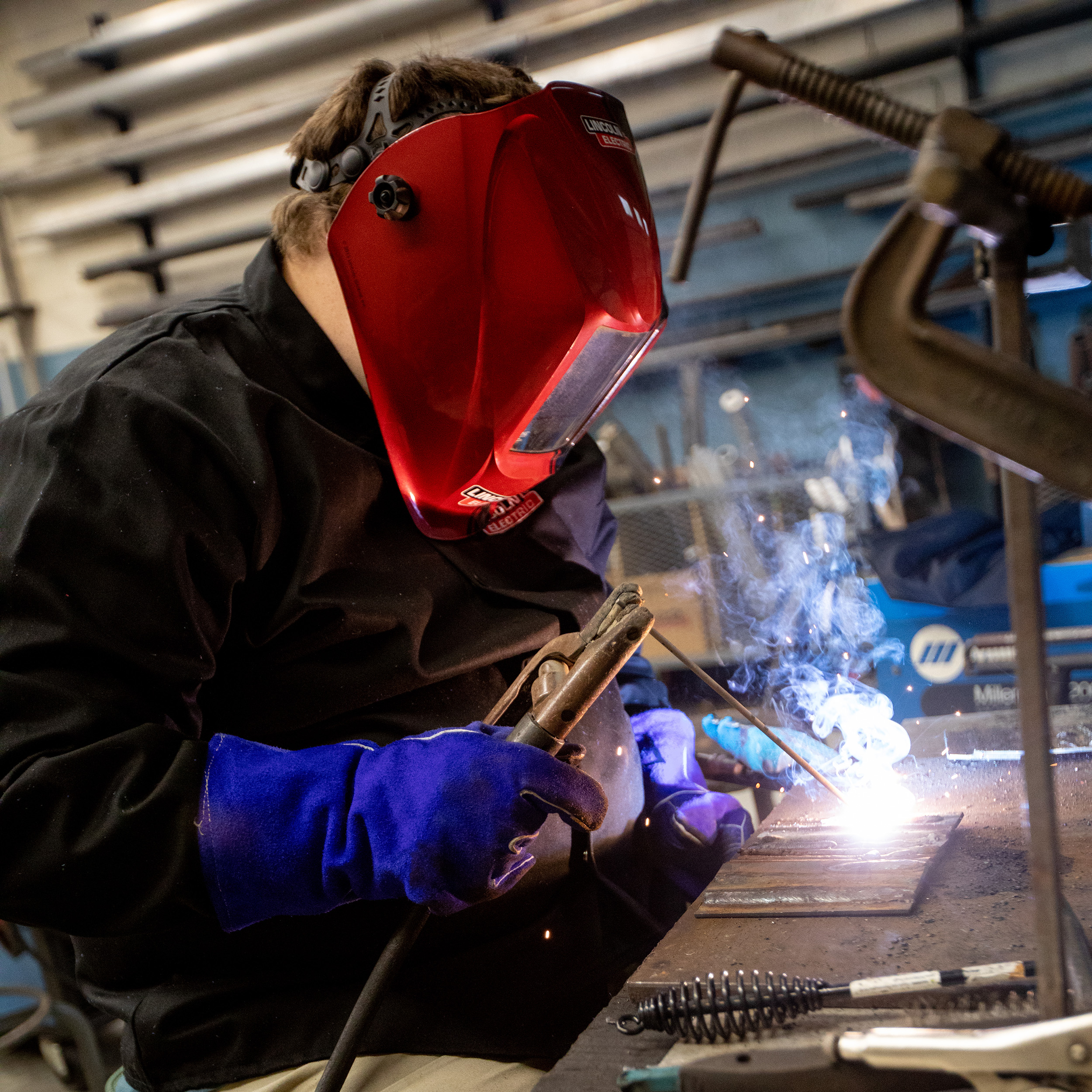 A student welding at Southern Adventist University.
