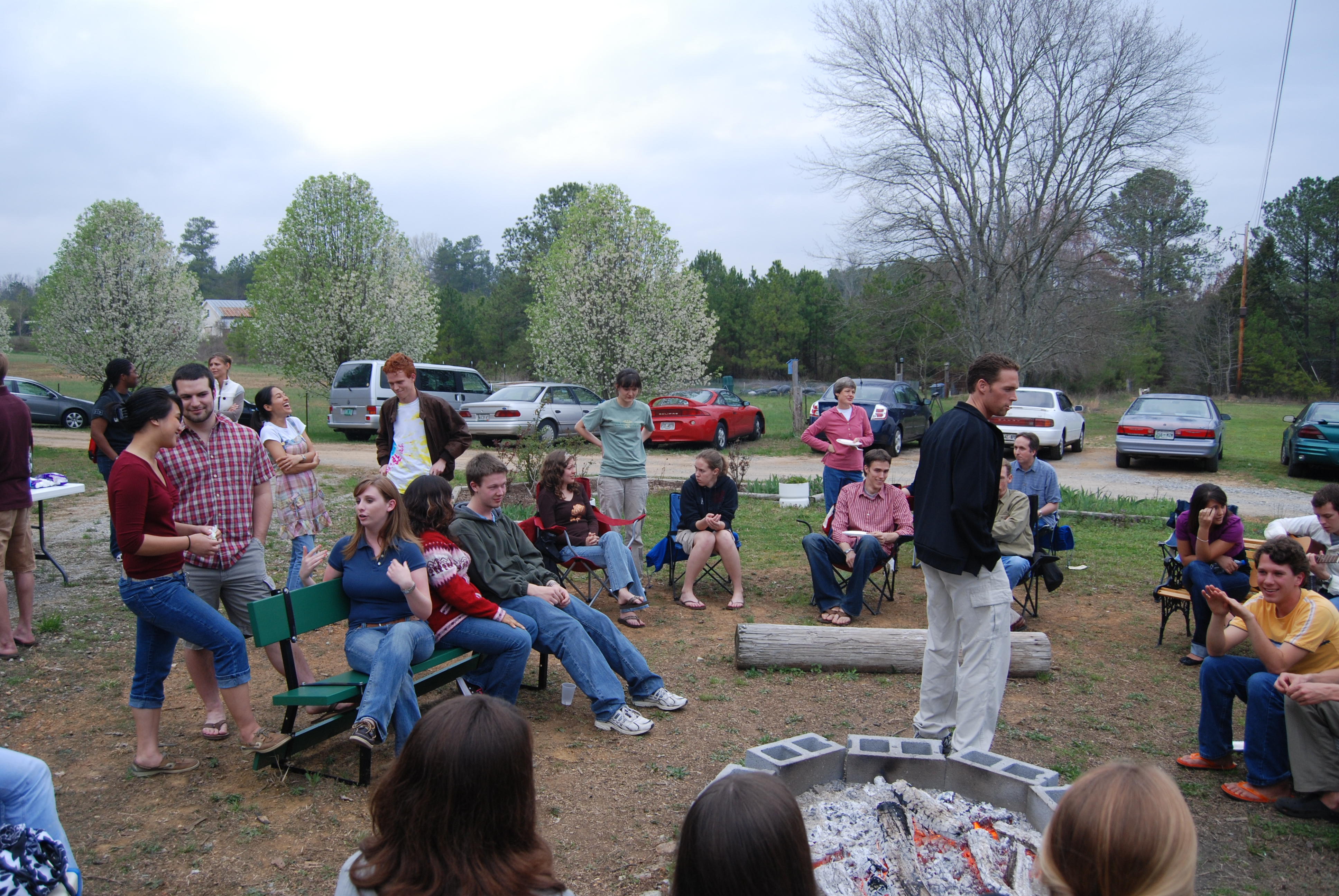 people gathered around a campfire