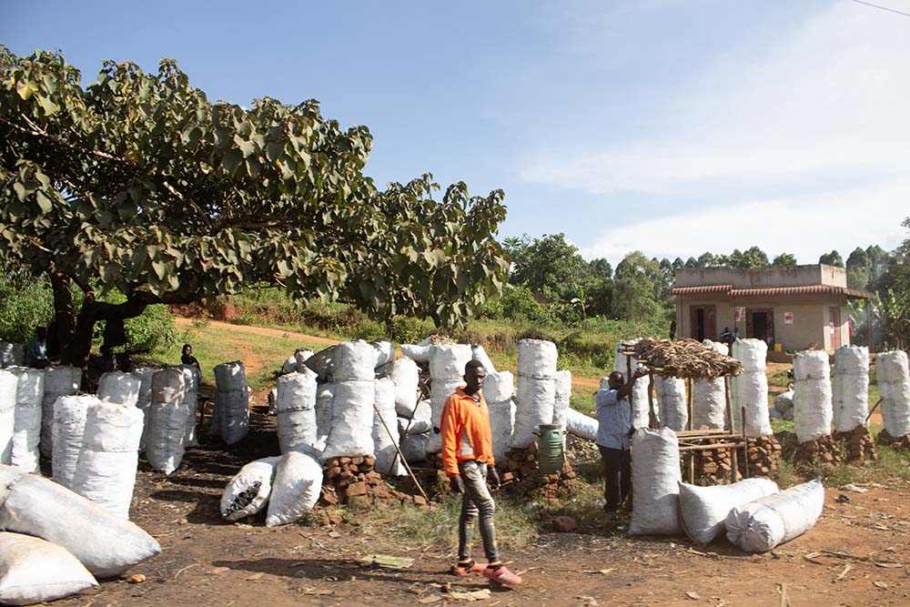 A local man selling goods by the roadside.