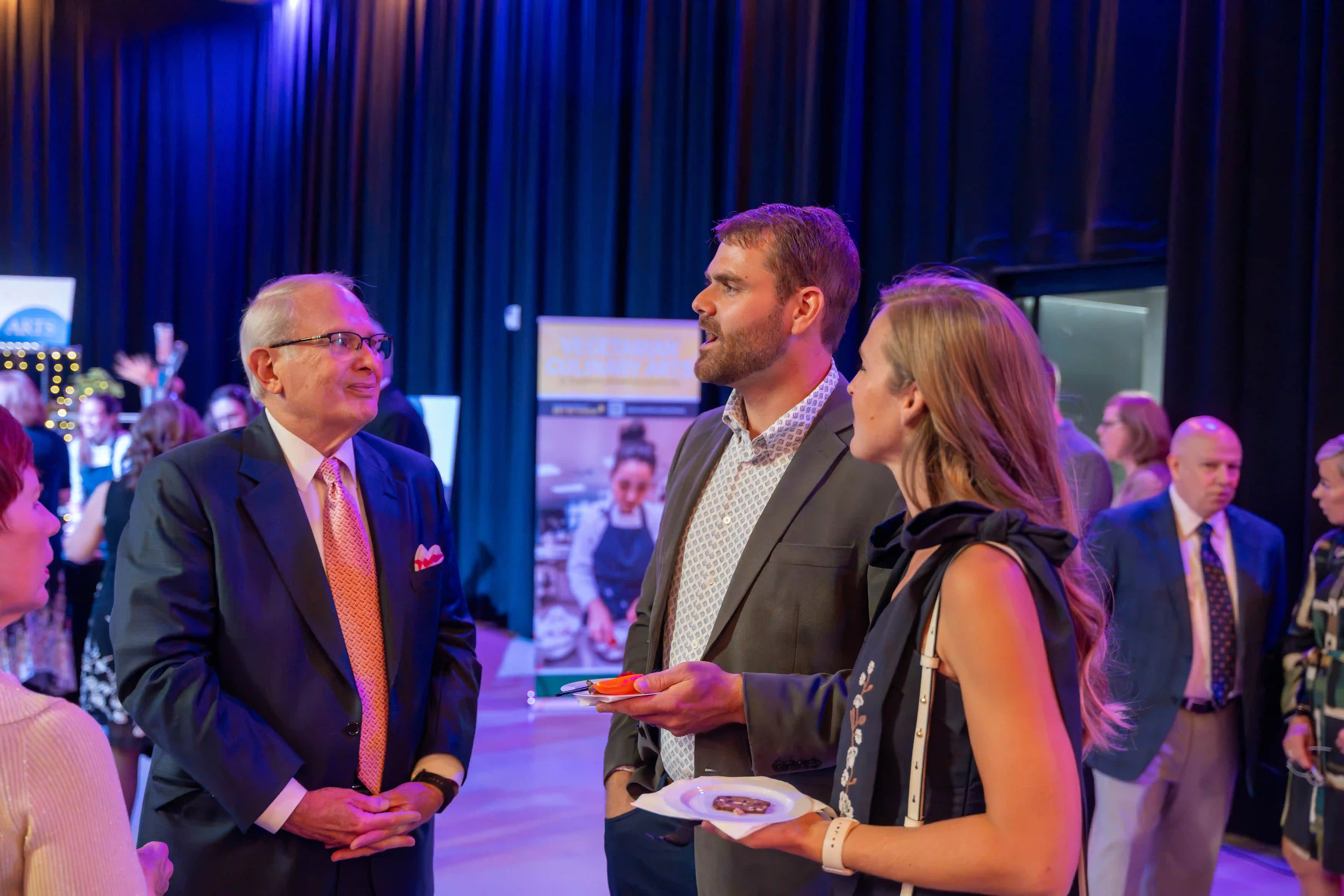 Kitty and Bill McGhinnis talking with Nathan and Bethany McKee