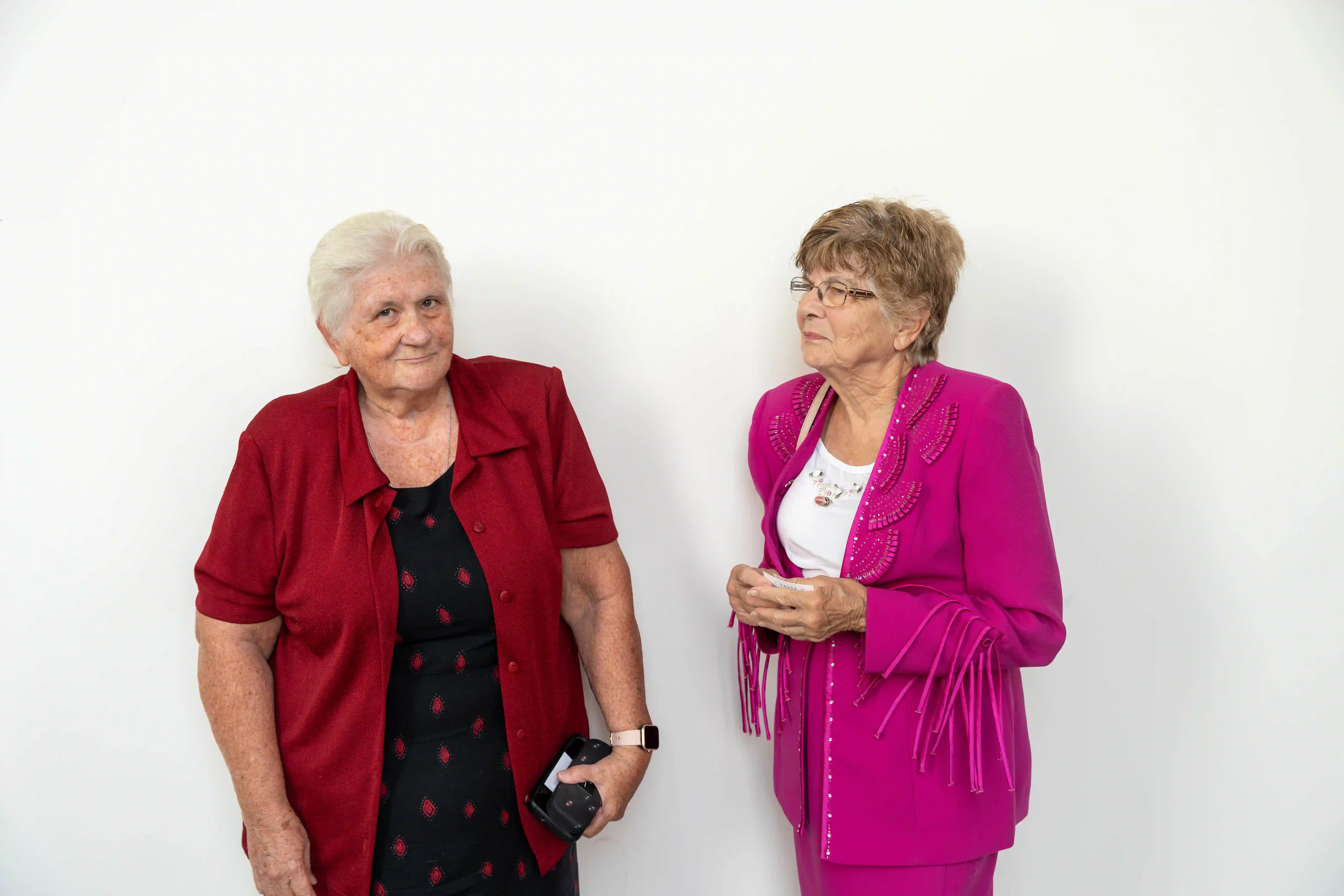 Jan Dunn and Carol Johnson standing next to each other talking