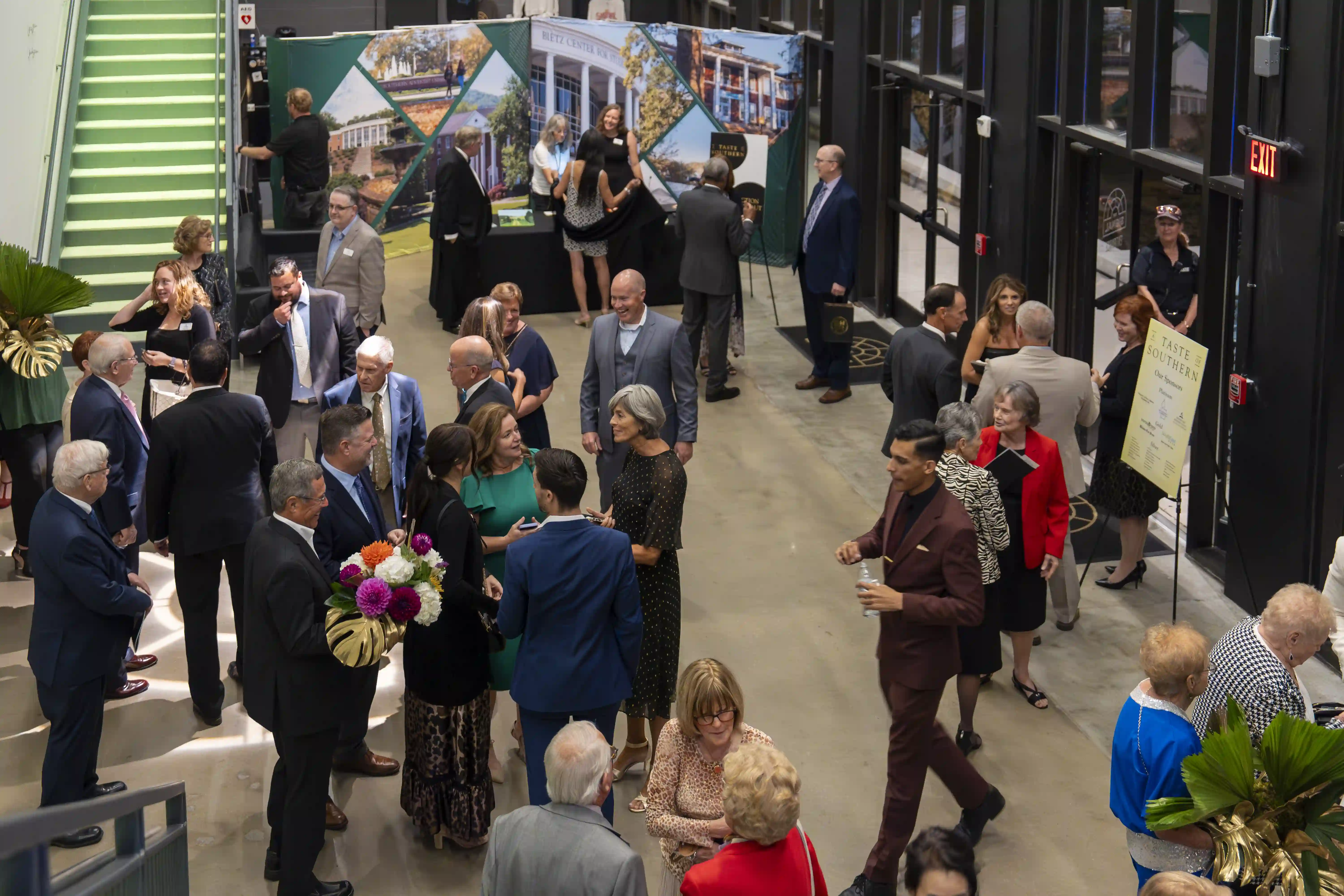 An overhead view of guests milling about the lobby of The Signal