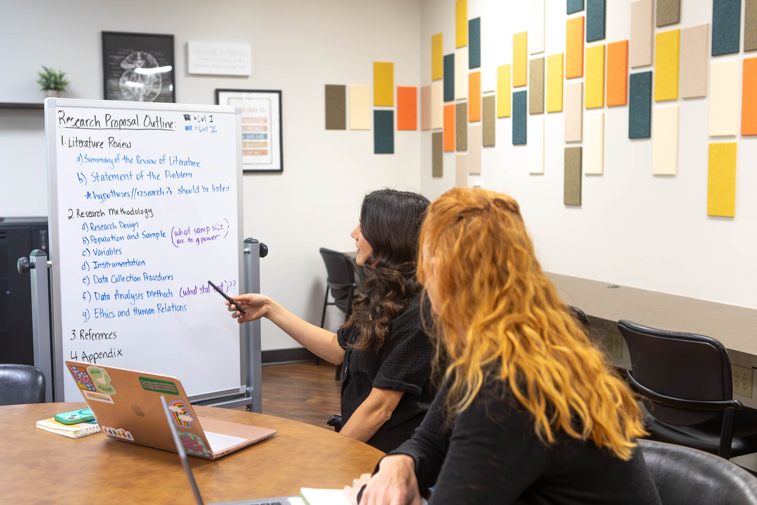 Research Hub members discussing ideas 