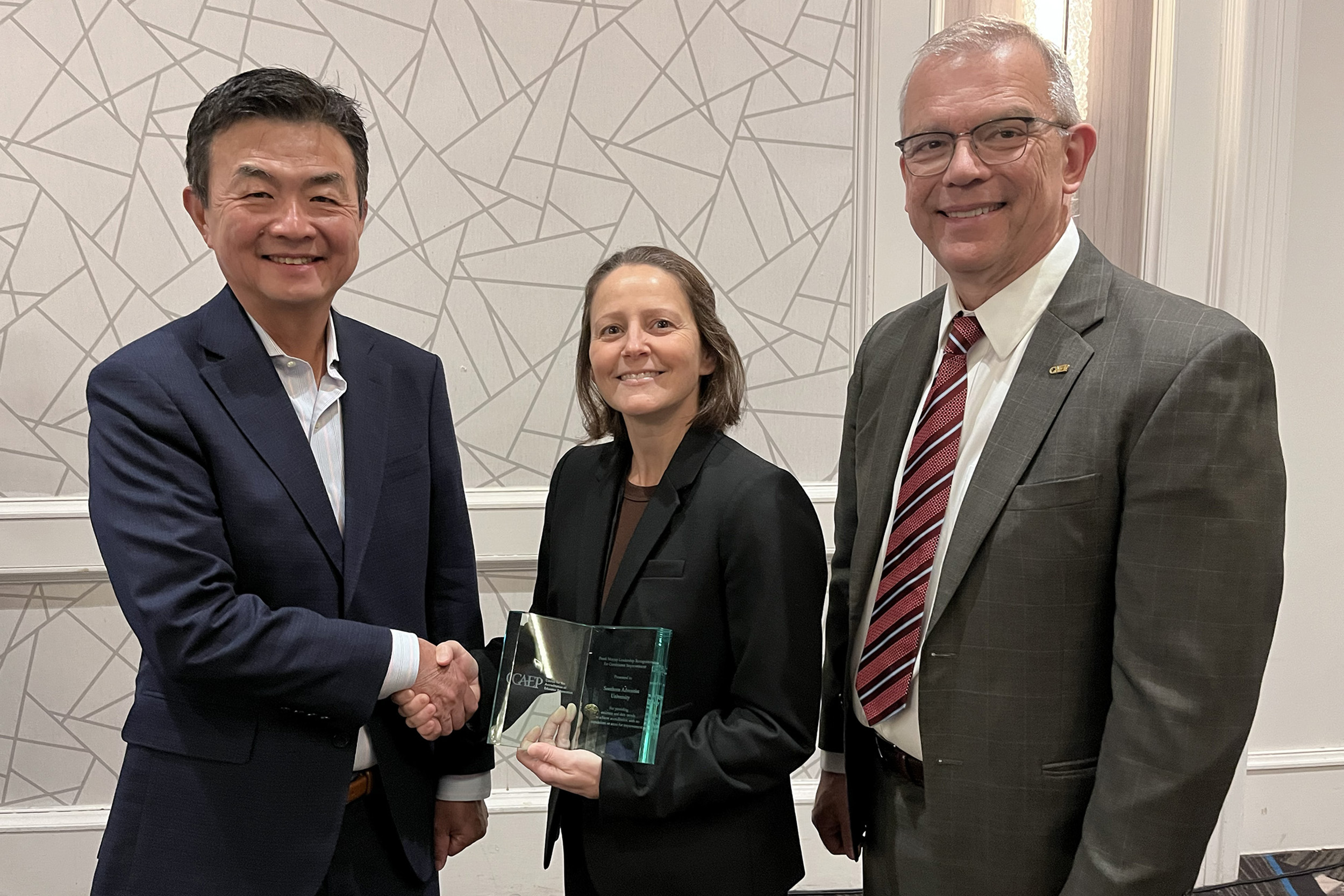 Katie McGrath accepts the award